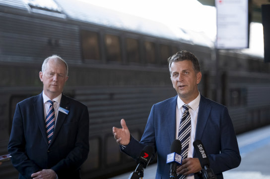 NSW Transport Minister Andrew Constance with Transport for NSW chief operations officer Howard Collins on Monday.
