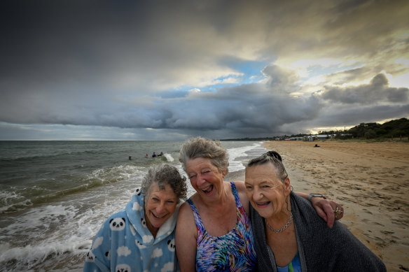 Sea Wolves co-founders Helen Luxton, Jo Hastings and Jen Fletcher on the beach in Mount Martha after a bracing cold-water swim last week.