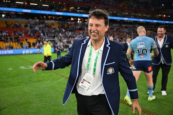 Laurie Daley celebrates the Origin series win in Brisbane.
