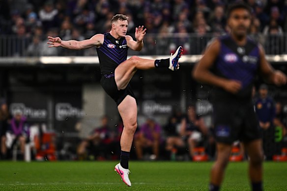 Josh Treacy launches into a shot on goal the last time the Dockers met Geelong. 