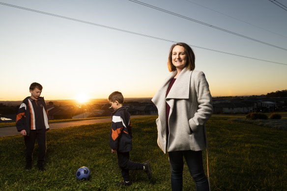 Kate Laney and her sons Lucas  and Nathan, who attend Gledswood Hills primary school. Laney moved to Gregory Hills on the assumption a new school would be built there.