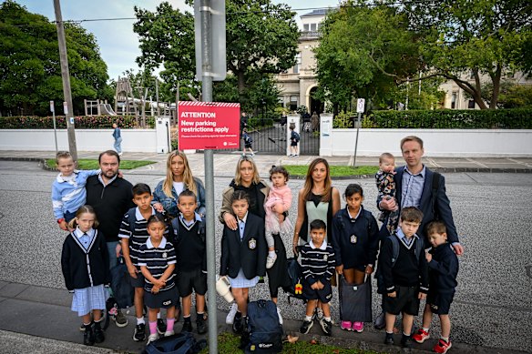 Parents and students of Caulfield Grammar pictured last year when new parking restrictions on Willoby Avenue in Glen Iris were introduced.