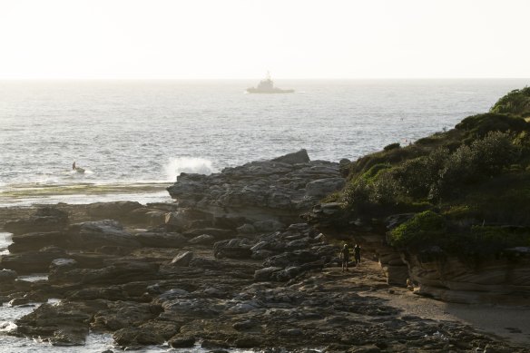 A jet-ski and boat in the distance at Little Bay on Thursday.