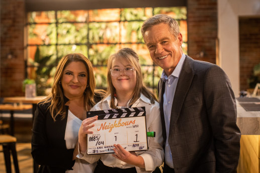 Henrietta Graham, centre, on the set of Neighbours, with actors Rebekah Elmaloglou and Stefan Dennis.