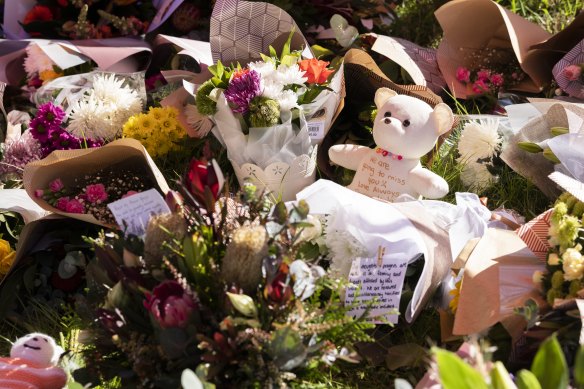 Tributes to the victims of the Hunter Valley bus crash at the memorial site.