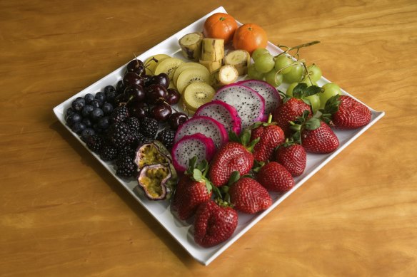 A fruit platter is served by volunteers at the Addi Road community centre.