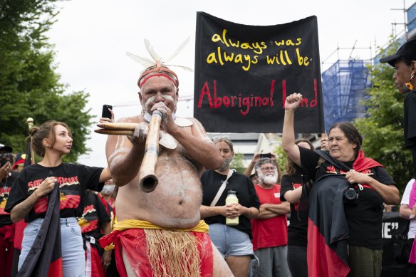 Protestors in Canberra march through the city for the 50th anniversary of the Tent Embassy.