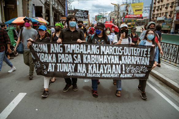 Protesters gather in Manila as the new Philippine president takes his oath.