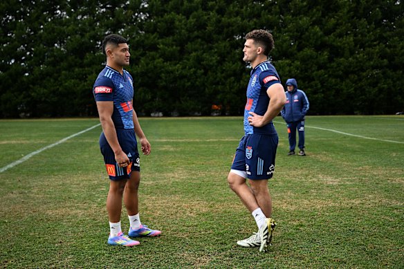 The future and present NSW No. 7: Isaiya Katoa rubs shoulders with Nathan Cleary at NSW training.
