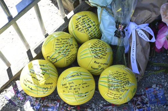 Tributes left for Jack Davey outside  Auburn South Primary School.