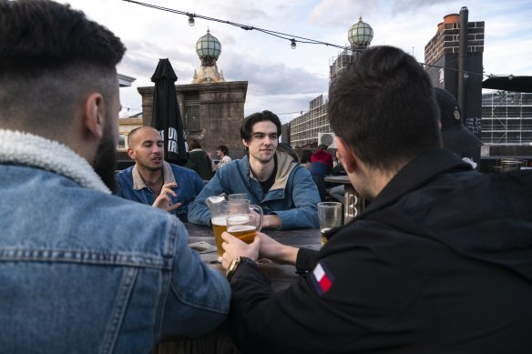 “I love my brothers, I haven’t seen them in a while”: Nick Henry and mates on the rooftop of the Lansdowne Hotel.
