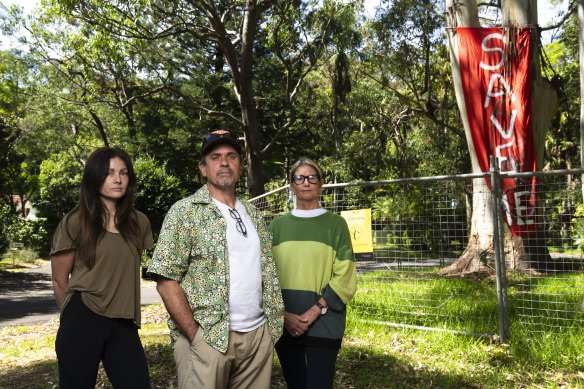 Ruskin Rowe residents Imogen Hajdu, Paul Johnson and Arabella Lockhart want the trees saved.