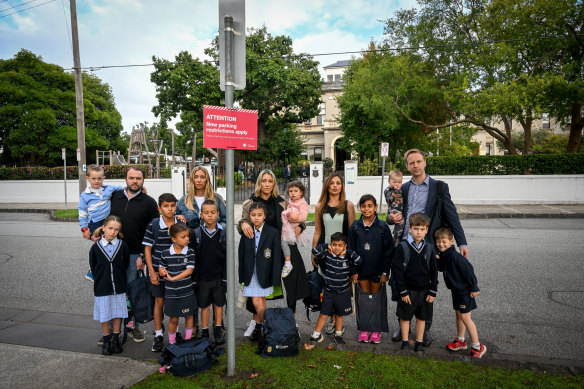 Parents of Caulfield Grammar students drop off their kids on Wednesday morning.