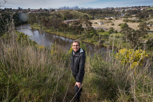 Idyllic spot: New Maribyrnong River advocate Dr Nicole Kowalczyk in Essendon West, with a Melbourne CBD view. 