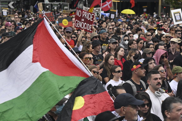 Thousands congregate at the steps of Parliament House for an Invasion Day rally in Melbourne.