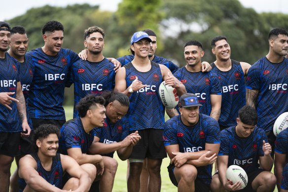 Jarome Luai poses with his teammates after training in Sydney on Friday.