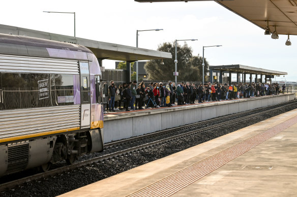 Commuters waiting to catch a V/Line train from Tarneit to the CBD on Friday morning. 