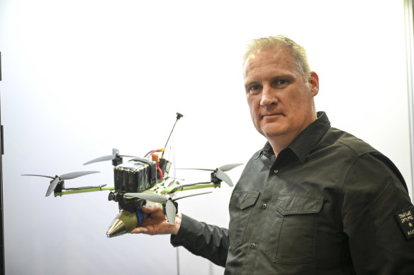 Travis Reddy at DefendTex with a drone the Australian company is testing in Ukraine against Russian forces and wants to build cheaper missiles in Australia to send over.