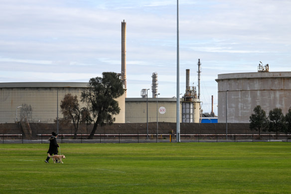 ExxonMobil’s fuel tank facility, which neighbours Techno Park Drive, viewed from a sporting field.