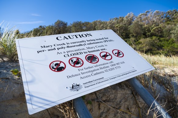 A sign warning of PFAS testing at Wreck Bay.