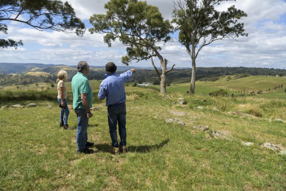 Propety owners Christine and Peter Rose, with Mal Brierley, are fighting Transgrid’s proposed route for the new power lines.