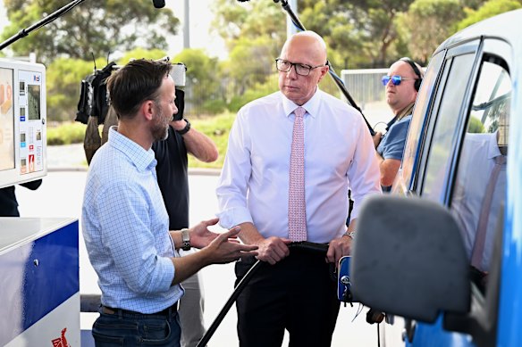 Opposition Leader Peter Dutton, joined by Liberal candidate for Moore, Vince Connelly, visits a fuel station in Perth.
