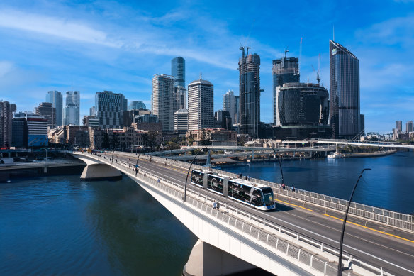 A Brisbane Metro vehicle travelling over the Victoria Bridge, which will be a route under a future version of the network.