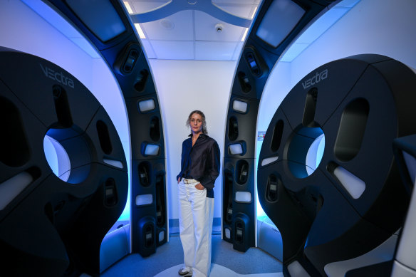 Amy Harris in front of the Alfred hospital’s Vectra machine, which takes hundreds of highly detailed pictures of a patient’s skin.