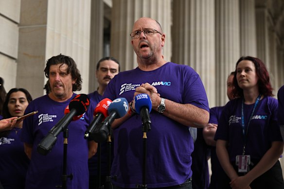 Australian Medical Association Victorian president Simon Judkins addresses the meda at the strike.
