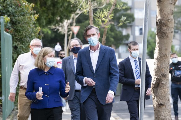 NSW Premier Dominic Perrottet, Minister for Health Brad Hazzard, Minister for Families, Communities and Disability Services Alister Henskens and Chief Health Officer Dr Kerry Chant provide an update on COVID-19 at Redfern on Saturday morning.