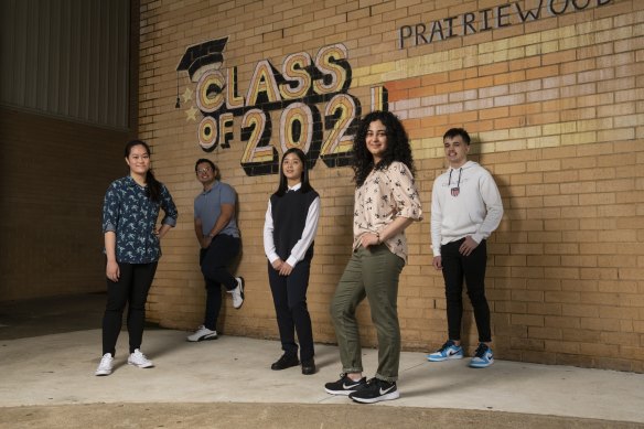 Students from Prairiewood High defied a harsh lockdown to excel in the 2021 HSC. From left to right: Steffi Tran, Ryan Taghvaei, Michelle Ung, Joshua Moon and Belinda Hanna. 