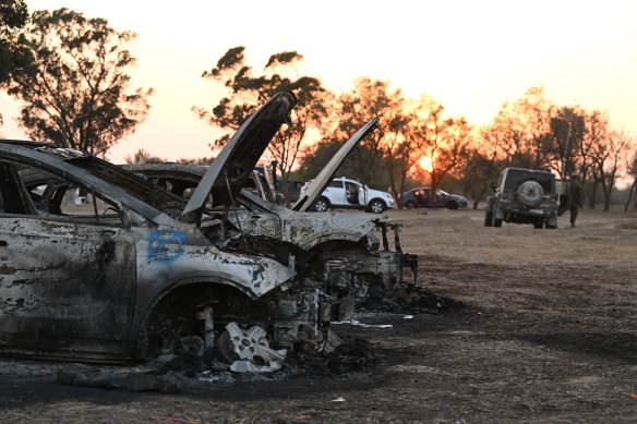 Burnt out cars at the site of the Supernova Music Festival where 260 Israelis were massacred on October 7.