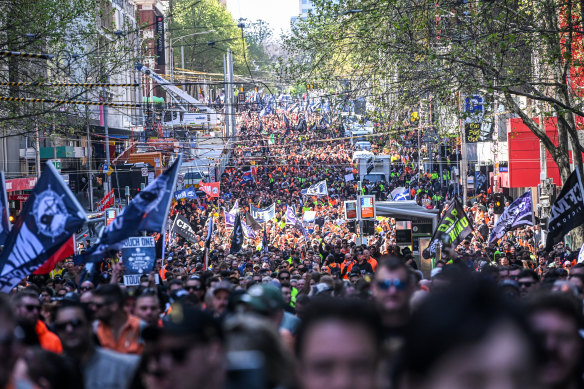 Tens of thousands of workers march through central Melbourne.