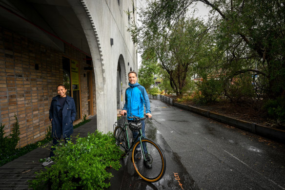 Kai Brach, pictured with fellow Nightingale Brunswick resident Christa Orcullo, said he shouldn’t have to pay for a parking spot he wouldn’t use. 