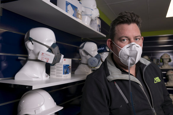 Director of On Site Safety Australia, Chris Bellamy demonstrating testing of a faulty face mask. Australia has been flooded with counterfeit mask since the coronavirus  pandemic.