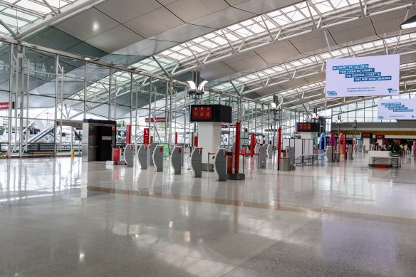 An empty domestic terminal at Sydney Airport after the northern beaches outbreak closed state borders and threw holiday plans into turmoil.