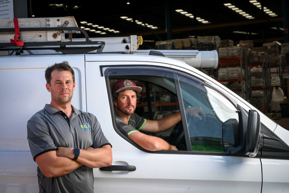 Electrician Mark Magill and business partner Dave Bryan ordered new cars in April, but they’re still waiting for them to be cleared at the docks.