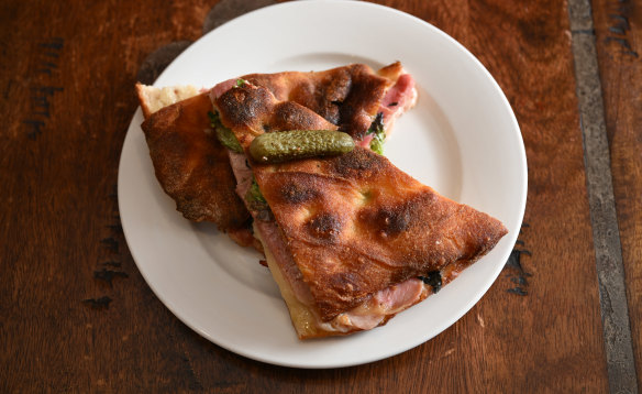 Fleischer’s roast beef focaccia, with sauteed spinach, seeded mustard and cheese.