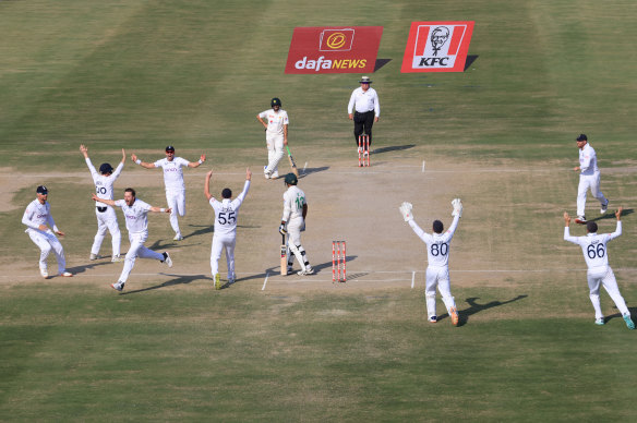 England celebrates the final wicket in their win over Pakistan in the second Test in Multan.