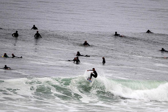 People surf at Lower Trestles, south of San Clemente, this week.