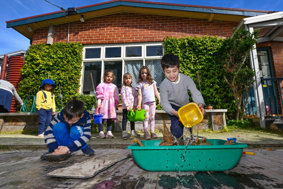 Children playing at Gardiner Preschool, which faces closure at the end of next year.