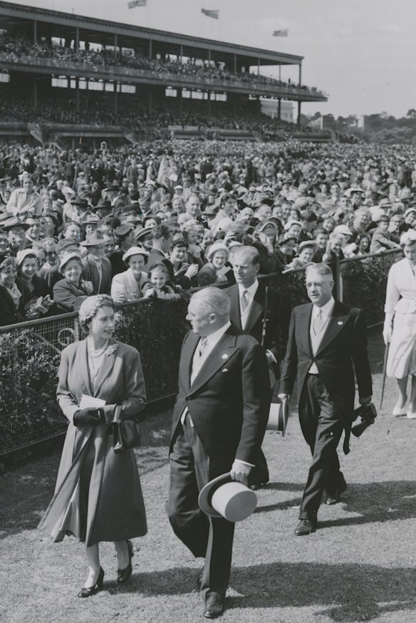 Queen Elizabeth II chats with Sir Chester Manifold, V.R.C. chairman, at Flemington Racecourse.