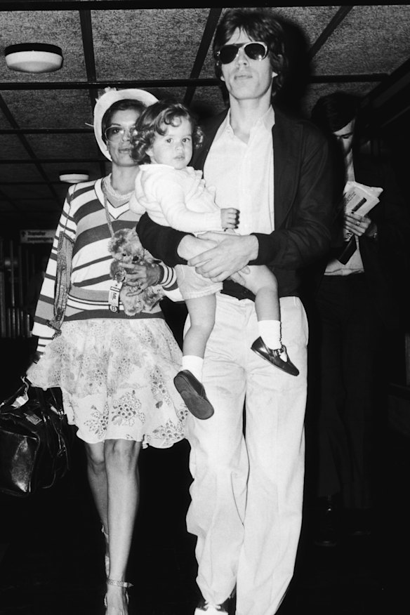 Rock star Mick Jagger with his wife Bianca and their daughter Jade, circa 1974.