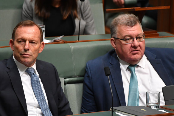Conservative MP Craig Kelly, right, pictured with former prime minister Tony Abbott, says the emissions reduction fund should not be topped up.