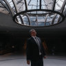 Wayne Hitches, executive program director at the Australian War Memorial, admires the oculus at the new entrance to the memorial.