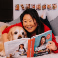 Nagi Maehashi with her dog Dozer and new book Tonight, which will be out on October 15.