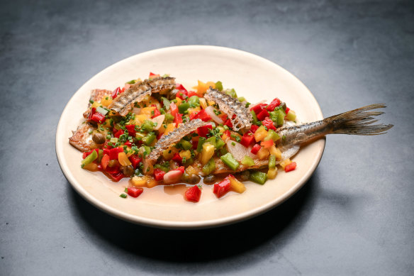 Garfish fillets in a sweet pepper sauce.