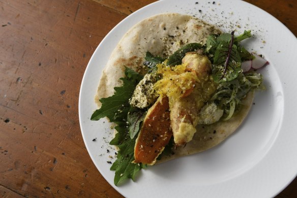 Fried carrot tortilla with fermented spicy carrot kimchi.