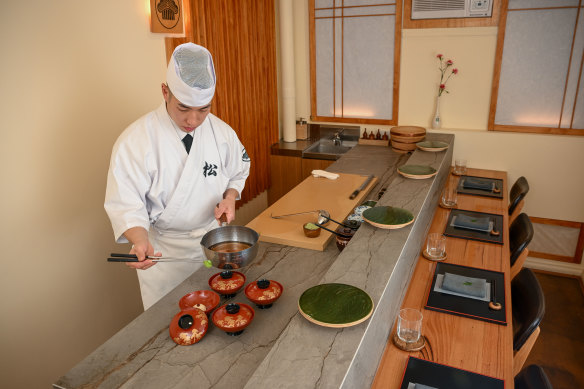 Lee serves the wanmono (lidded) dish.