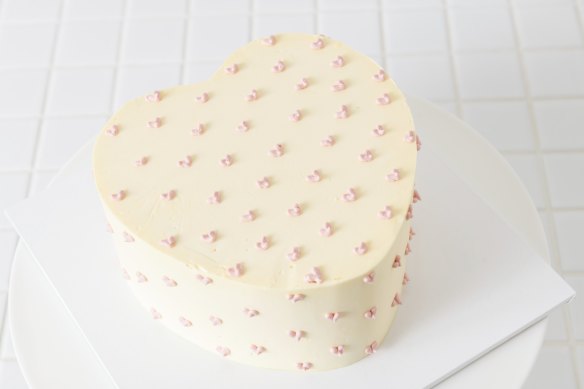A heart-shaped custom cake.